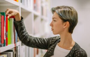 young subculture punk woman in library