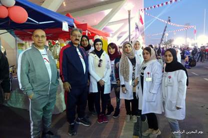 Group photo of students and staff at the Community Marathon event